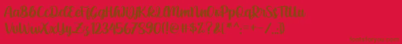 anthusia-Schriftart – Braune Schriften auf rotem Hintergrund