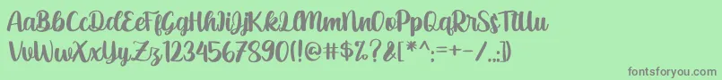 anthusia Font – Gray Fonts on Green Background
