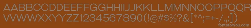 GalderglynnTitlingLt Font – Gray Fonts on Brown Background