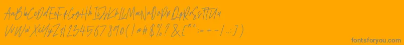 Antilkat-Schriftart – Graue Schriften auf orangefarbenem Hintergrund