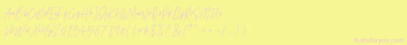 Antilkat-Schriftart – Rosa Schriften auf gelbem Hintergrund