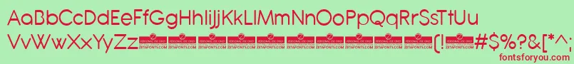 Antipasto Pro Regular trial Font – Red Fonts on Green Background
