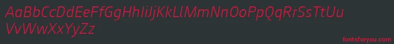 Czcionka Augustsans46lightitalic – czerwone czcionki na czarnym tle