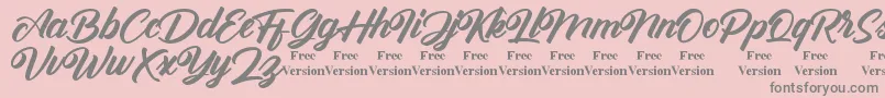 Antonellie Callygraphy Demo Font – Gray Fonts on Pink Background