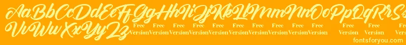 Antonellie Callygraphy Demo Font – Yellow Fonts on Orange Background