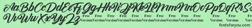 Шрифт Antonellie Callygraphy Demo – чёрные шрифты на зелёном фоне
