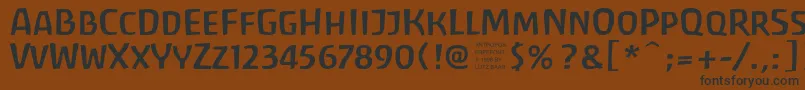 フォントantrf    – 黒い文字が茶色の背景にあります