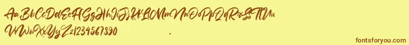 Anttisol Font – Brown Fonts on Yellow Background
