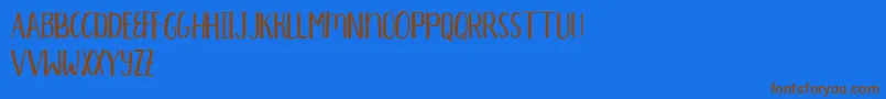 Aprils Demo Font – Brown Fonts on Blue Background