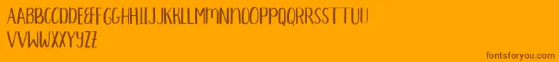 fuente Aprils Demo – Fuentes Marrones Sobre Fondo Naranja