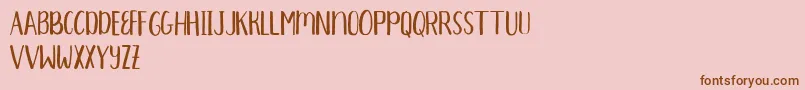 Aprils Demo Font – Brown Fonts on Pink Background