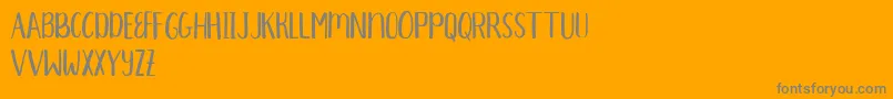 Aprils Demo Font – Gray Fonts on Orange Background