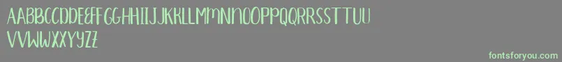 Aprils Demo Font – Green Fonts on Gray Background