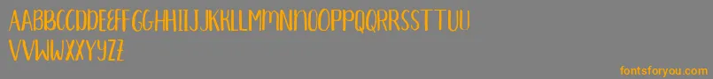 Aprils Demo Font – Orange Fonts on Gray Background