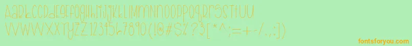 AprilShowers Regular Sample Font – Orange Fonts on Green Background