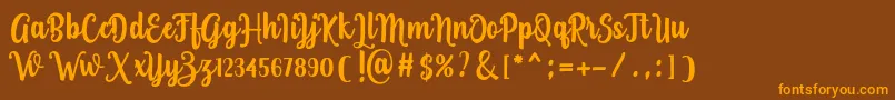 aquarium Font – Orange Fonts on Brown Background