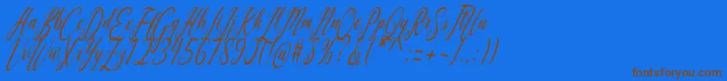 Fonte Aquilera Script – fontes marrons em um fundo azul