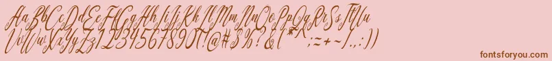 Aquilera Script-Schriftart – Braune Schriften auf rosa Hintergrund