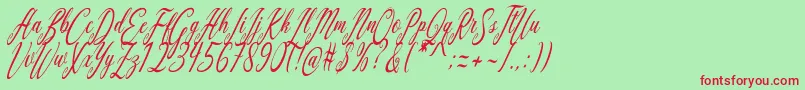 Aquilera Script-Schriftart – Rote Schriften auf grünem Hintergrund