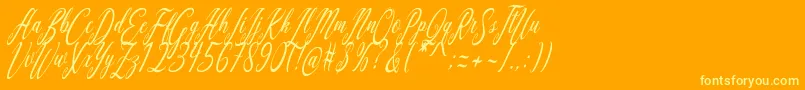 フォントAquilera Script – オレンジの背景に黄色の文字