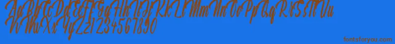 Aquilland Font – Brown Fonts on Blue Background