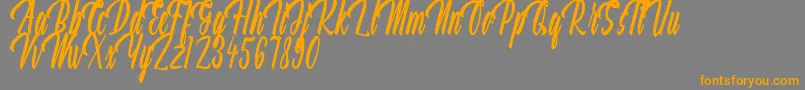 Aquilland Font – Orange Fonts on Gray Background