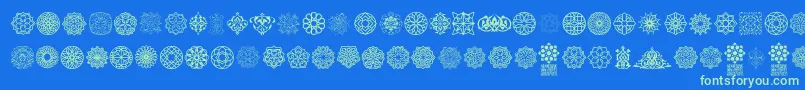 Arabesque Ornaments Font – Green Fonts on Blue Background