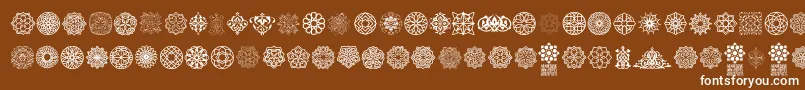 Arabesque Ornaments-Schriftart – Weiße Schriften auf braunem Hintergrund