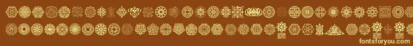 Arabesque Ornaments Font – Yellow Fonts on Brown Background