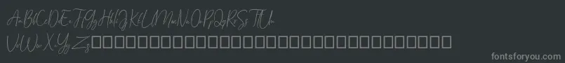 Czcionka Arandalle Script Demo – szare czcionki na czarnym tle