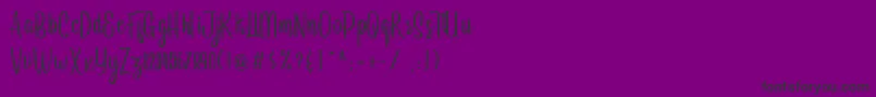 Arayara demo-fontti – mustat fontit violetilla taustalla