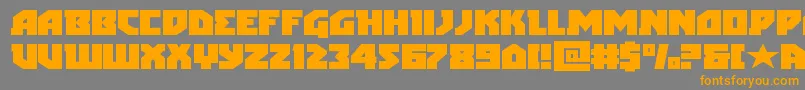 フォントarcticguardianexpand – オレンジの文字は灰色の背景にあります。