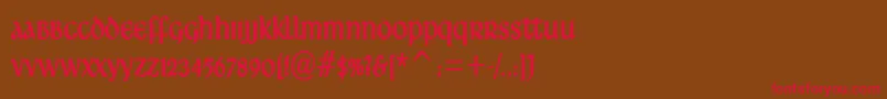 フォントArdagh – 赤い文字が茶色の背景にあります。