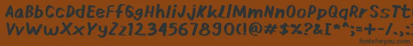 Ardies Font – Black Fonts on Brown Background