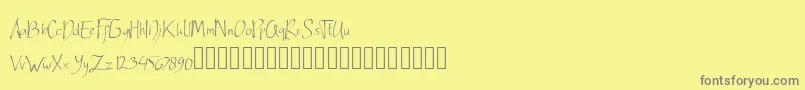 フォントArdnerandemo – 黄色の背景に灰色の文字
