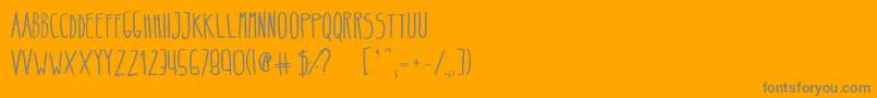 フォントBeltaRegular – オレンジの背景に灰色の文字