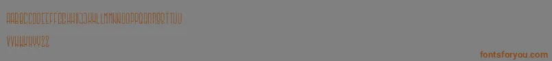 Argapuri regular-Schriftart – Braune Schriften auf grauem Hintergrund