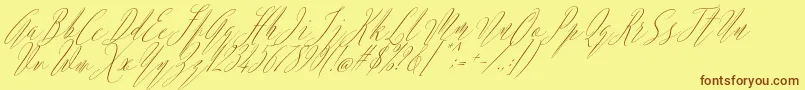 Fonte Argentina Script Italic – fontes marrons em um fundo amarelo