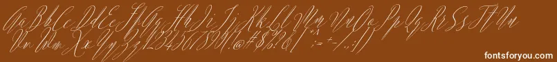 Шрифт Argentina Script Italic – белые шрифты на коричневом фоне