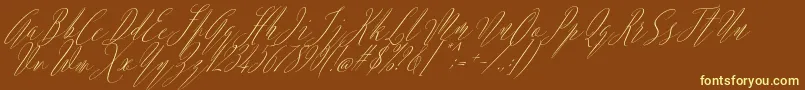 Argentina Script Italic-fontti – keltaiset fontit ruskealla taustalla