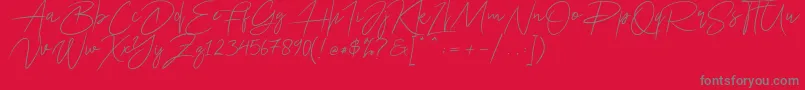 Fonte Ariel Script – fontes cinzas em um fundo vermelho