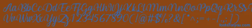 Czcionka Arinda Font by 7NTypes – niebieskie czcionki na brązowym tle