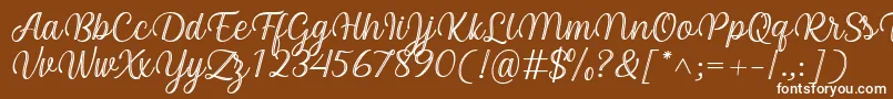 Czcionka Arinda Font by 7NTypes – białe czcionki na brązowym tle