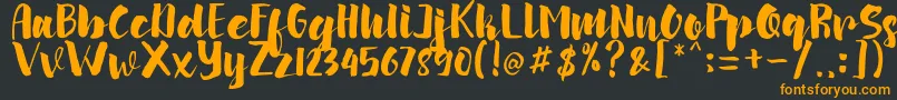 arinda Font – Orange Fonts on Black Background