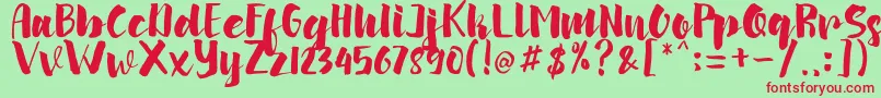 arinda-Schriftart – Rote Schriften auf grünem Hintergrund