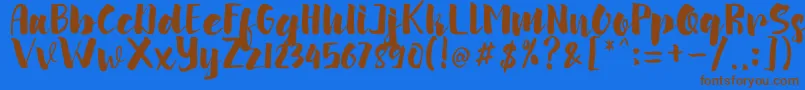 arinda Font – Brown Fonts on Blue Background