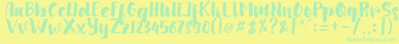 arinda Font – Green Fonts on Yellow Background