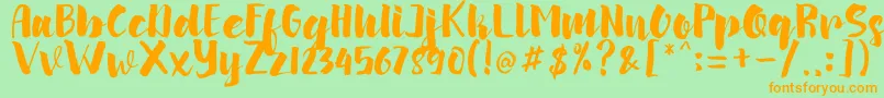 arinda Font – Orange Fonts on Green Background