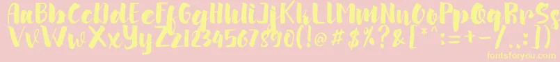arinda Font – Yellow Fonts on Pink Background
