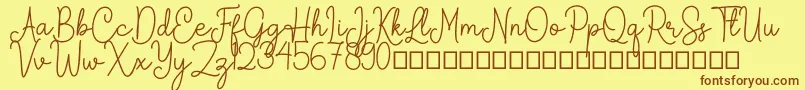 Arkina Font – Brown Fonts on Yellow Background